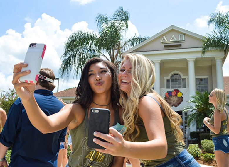 taking a selfie during an original orlando tours visit to UCF prior to the airboat ride