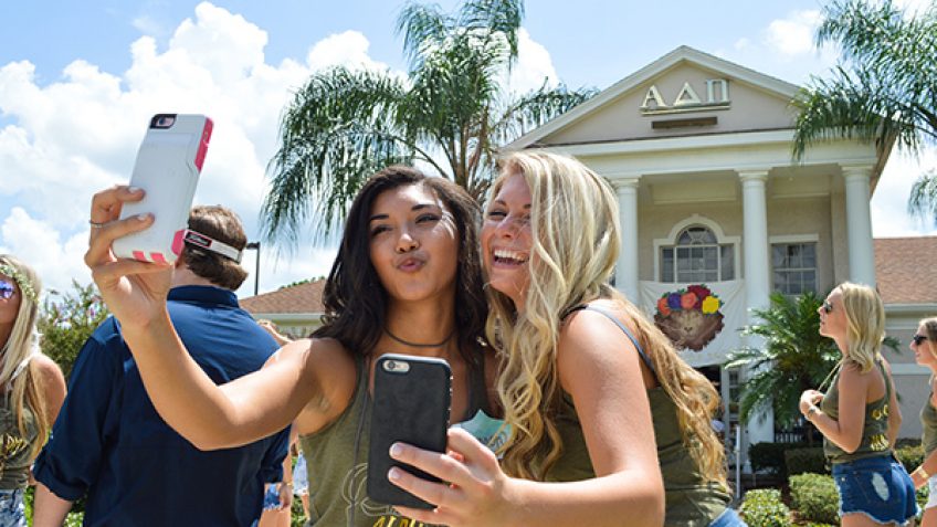 taking a selfie during an original orlando tours visit to UCF prior to the airboat ride