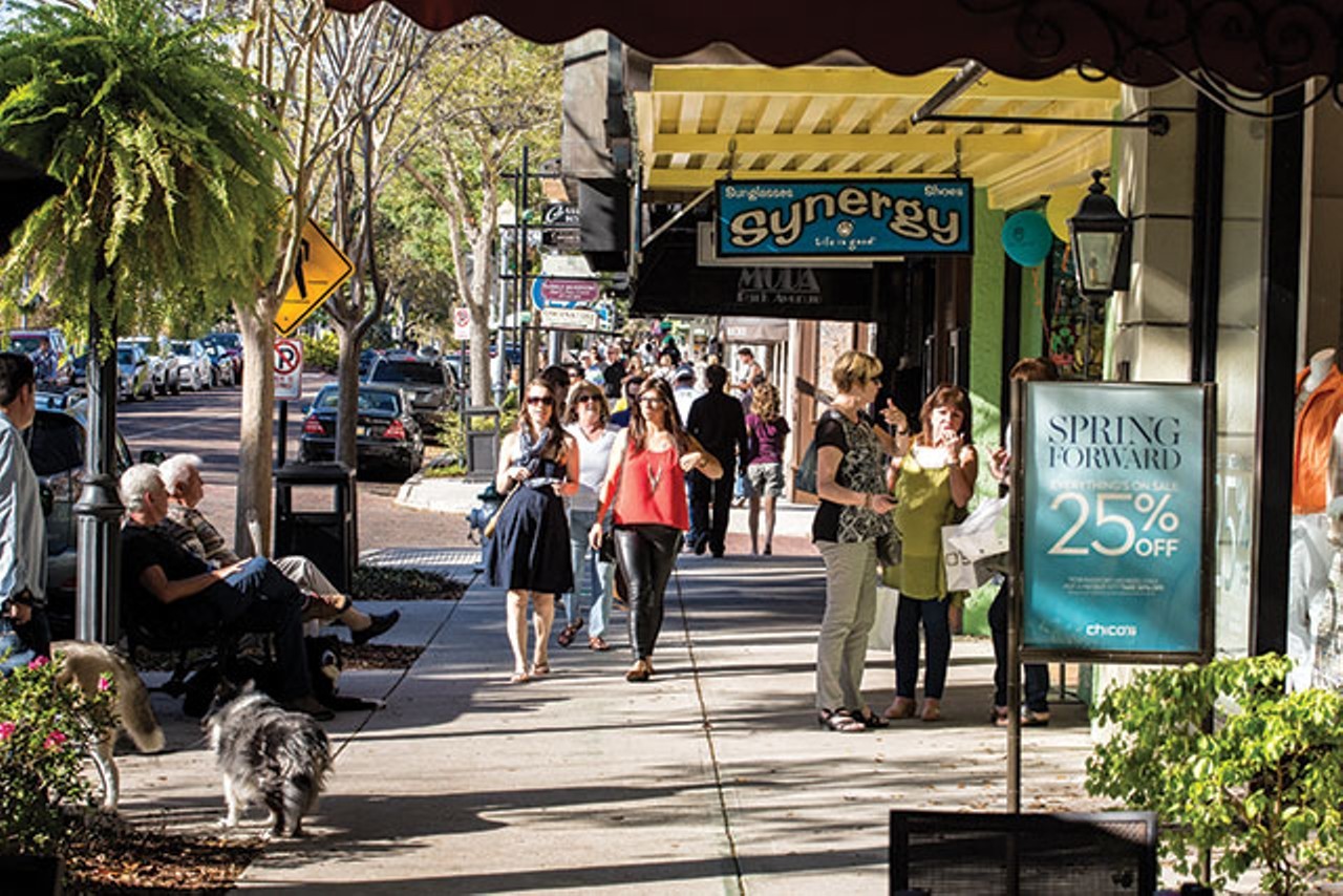 friends walking and shopping on park avenue in historic old world winter park during original orlando tours